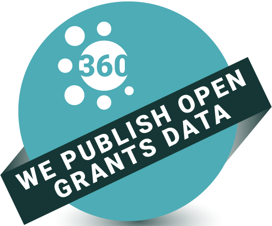 A teal circular badge with the number 360 surrounded by white dots, overlaid by a dark band stating WE PUBLISH OPEN GRANTS DATA in bold white letters.